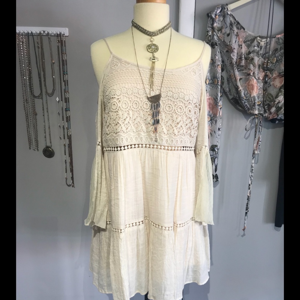Vivid collection cream cold shoulder dress!